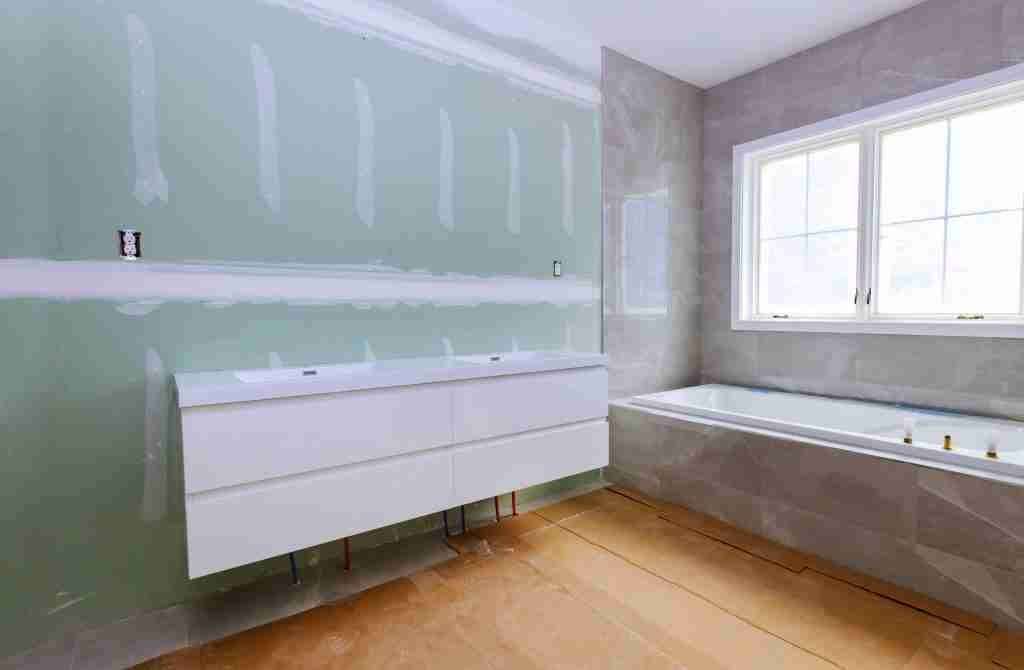 tiled bathroom with windows molding